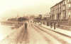 Unknown artist (19th century): Arwenack Street, Falmouth with the Killigrew monument and the first Falmouth Art Gallery, photograph, 20.5 x 29.5 cms.