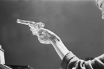Penrose, Sir Roland (1900-1984): Nusch Eluard and a glass gun, Lambe Creek, photograph, 29.7 x 39.1 cms. Purchased with grant aid from the Esmee Fairbairn Foundation in 2004. © Roland Penrose Estate. All rights reserved.
