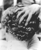 Miller, Lee (1907-1977): Woman with her hand on her head, Paris, inscribed Lee Miller Archives stamp, photograph, 37 x 29.5 cms. Purchased with grant aid from the Esmee Fairbairn Foundation in 2004. © Lee Miller Archive. All rights reserved.