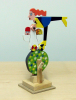 Markey, Peter (1930-2016): Green Shopping, signed, automaton, 26 x 18 x 9 cms. Presented by Hine Downing, Solicitors.