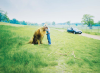 Meek, Nick : Boy with Lion, photograph, 42 x 59 cms. Presented by the artist.
