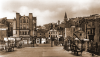 Unknown artist (early 20th century): Market Strand from Prince of Wales Pier, Falmouth, photograph, 15.8 x 26.6 cm. Presented by E Thomas & Company Ltd, Falmouth.