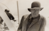 Unknown artist: Sir Matthew Smith on board a boat in a hat, photograph, 8.8 x 13.8 cms. Presented by Peter Flutter from the Estate of Betty Newmarch.