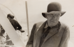 Unknown artist: Sir Matthew Smith on board a boat in a hat, photograph, 8.8 x 13.8 cms. Presented by Peter Flutter from the Estate of Betty Newmarch.